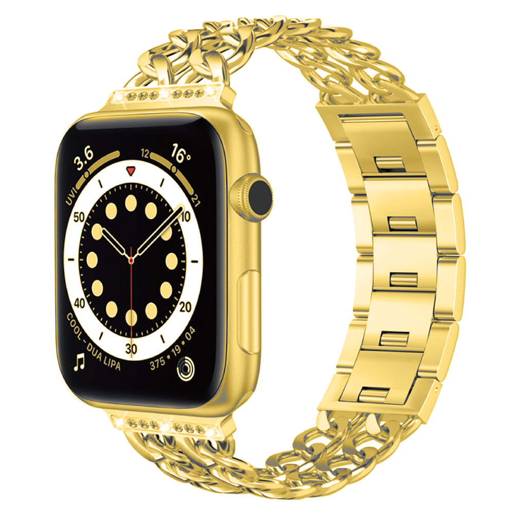 Eine goldene Apple Watch mit Digitalanzeige für Uhrzeit, Temperatur und Aktivitätssymbole. Sie verfügt über das arktisband Apple Watch Armband „Princess“ von arktisband aus goldenem Metall mit glänzender Gliederstruktur und dekorativen Details.