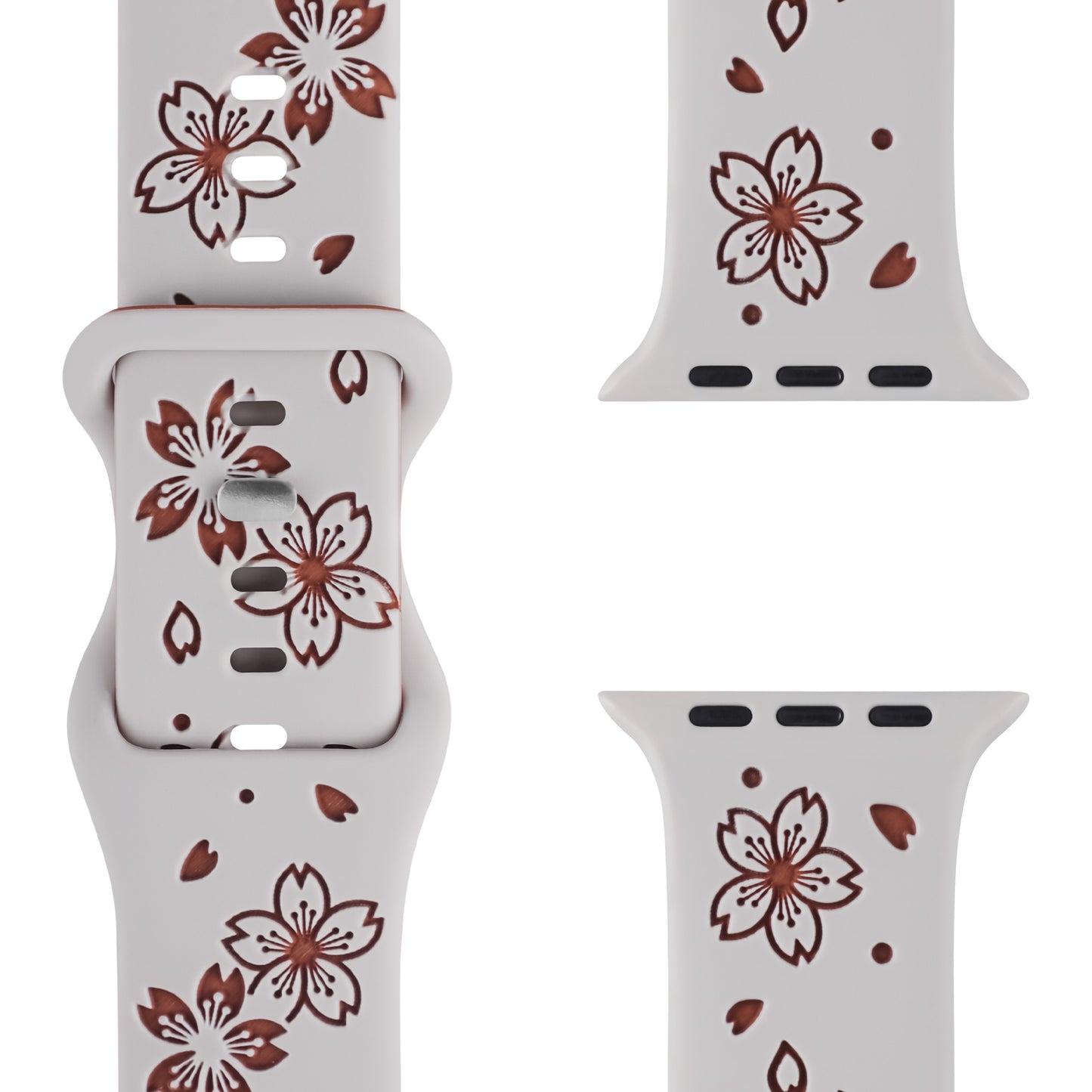 Eine Nahaufnahme des arktisband Apple Watch Armbands „Flores“ von arktisband zeigt sein braunes Kirschblüten-Blumendesign mit verstreuten Blütenblättern auf hellem Hintergrund, wodurch sowohl die Schnalle als auch die Anschlussenden hervorgehoben werden.