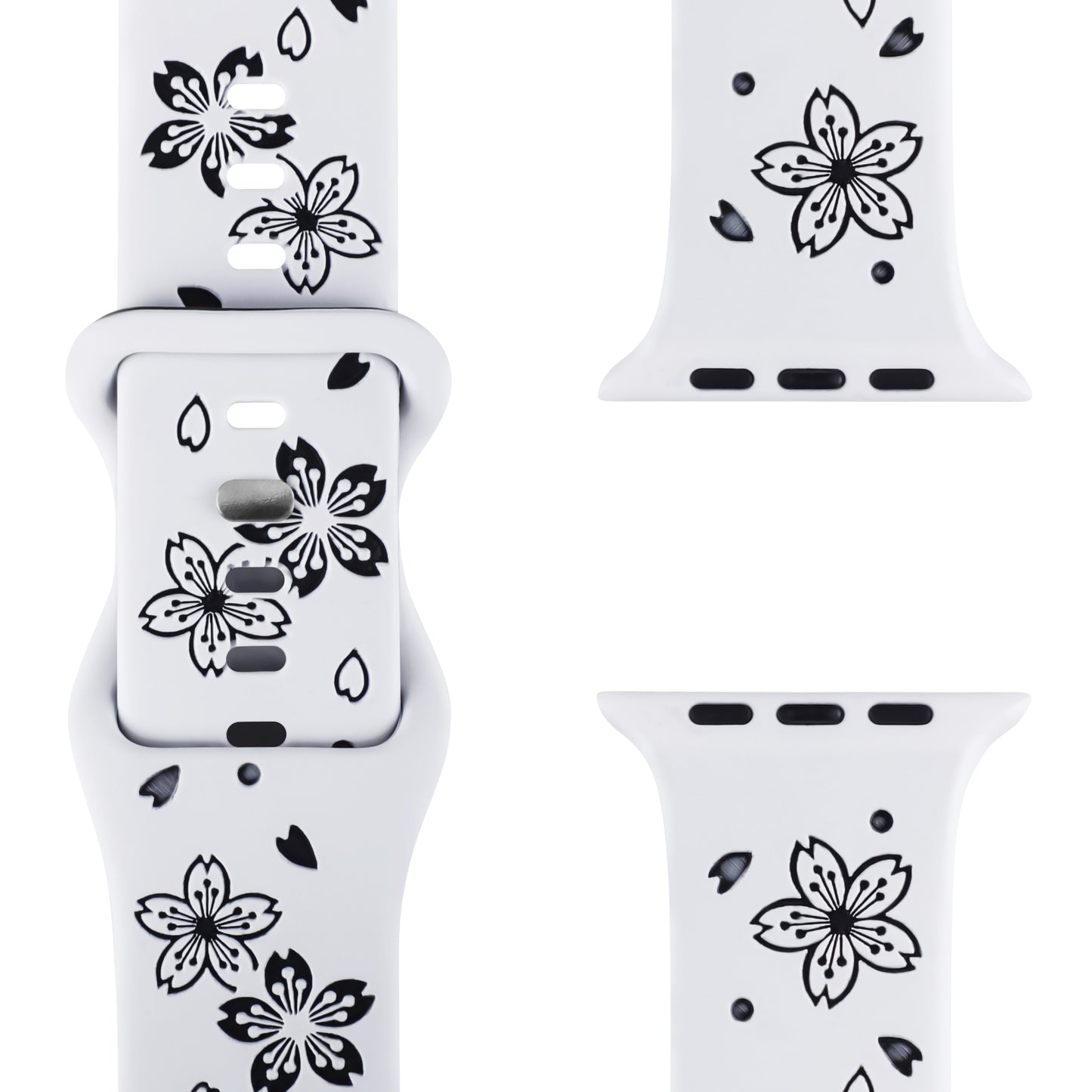 Das arktisband Apple Watch Armband „Flores“ von arktisband, bestehend aus einem weißen Silikonband mit schwarzem Blumenmuster, wird aus mehreren Winkeln angezeigt, darunter Nahaufnahmen der Schnalle und beider Bandenden.
