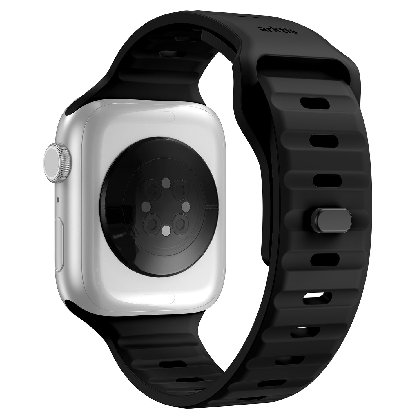 Eine Nahaufnahme zeigt die Rückseite einer weißen Apple Watch mit dem arktisband Silikonarmband „Active“ von arktisband im schwarzen, atmungsaktiven Sportdesign mit mehreren Löchern und Knopfverschluss; Sensoren auf dem Zifferblatt sind sichtbar.