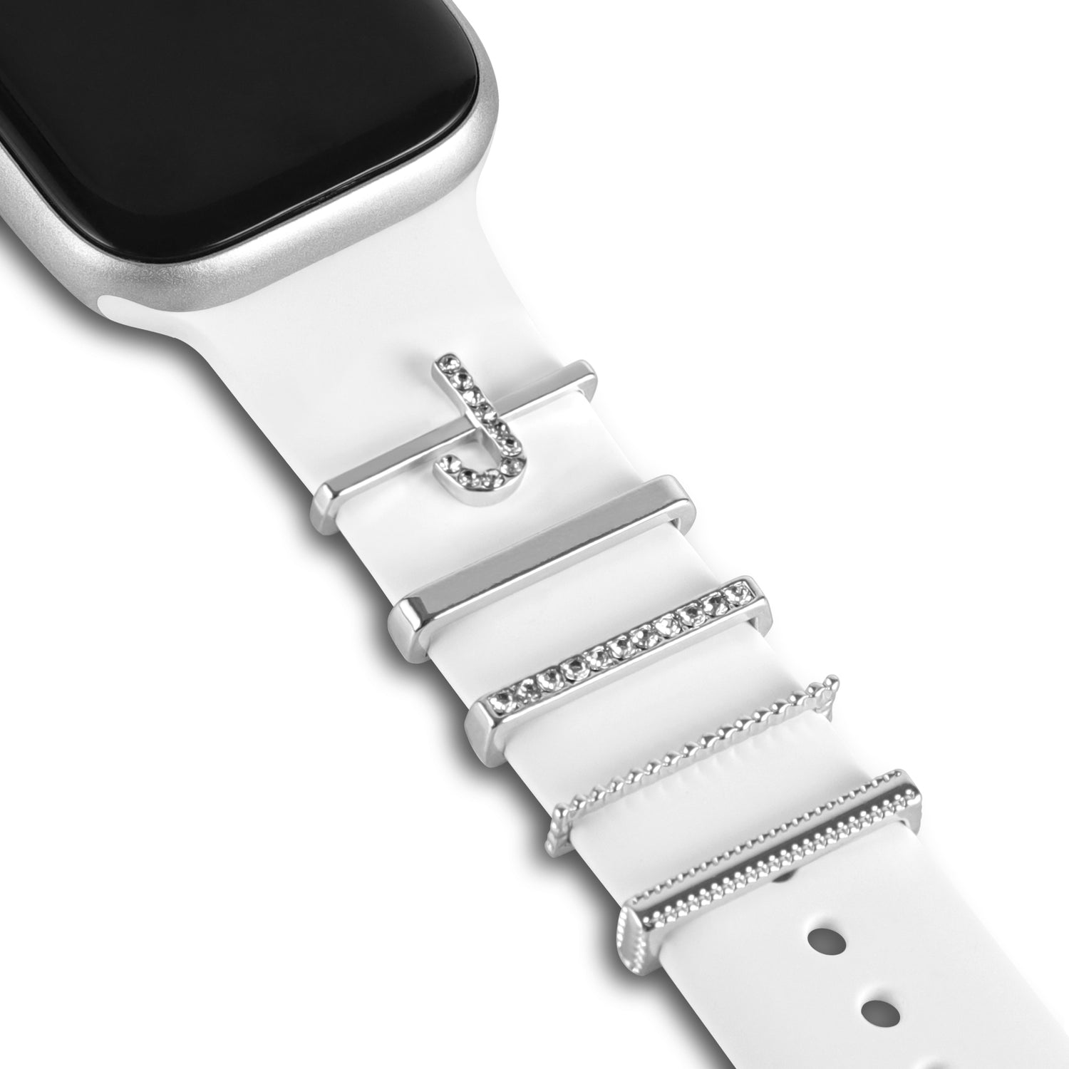 Die arktisband Apple Watch Charms „J Style“ verleihen Ihrem weißen arktisband Smartwatch-Armband mit silbernen Akzenten und funkelnden Strasssteinen einen extravaganten Look.