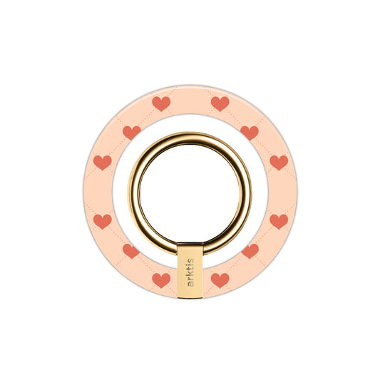 Der arktis Magnetischer Ringhalter für MagSafe - Love hat einen pinkfarbenen Sockel mit roten Herzen und einen goldenen Ring. Starke N52-Magnete sorgen für sichere MagSafe-Kompatibilität und machen ihn zum perfekten, stylischen Zubehör für Ihr iPhone.