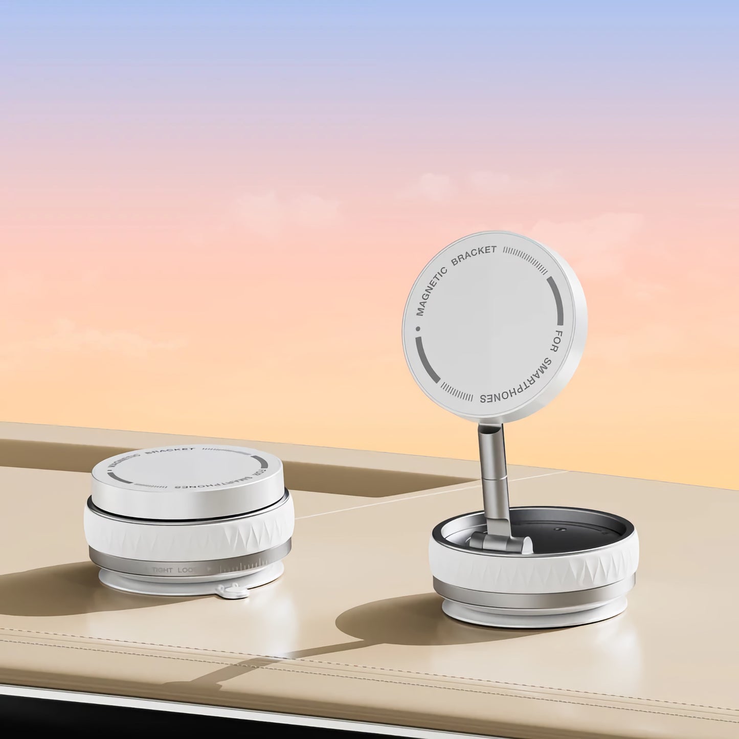 Zwei kompakte, weiße arktis MagicDock iPhone MagSafe Halterungen von arktis ruhen auf einer beigen Oberfläche vor einem pastellfarbenen Himmelshintergrund.