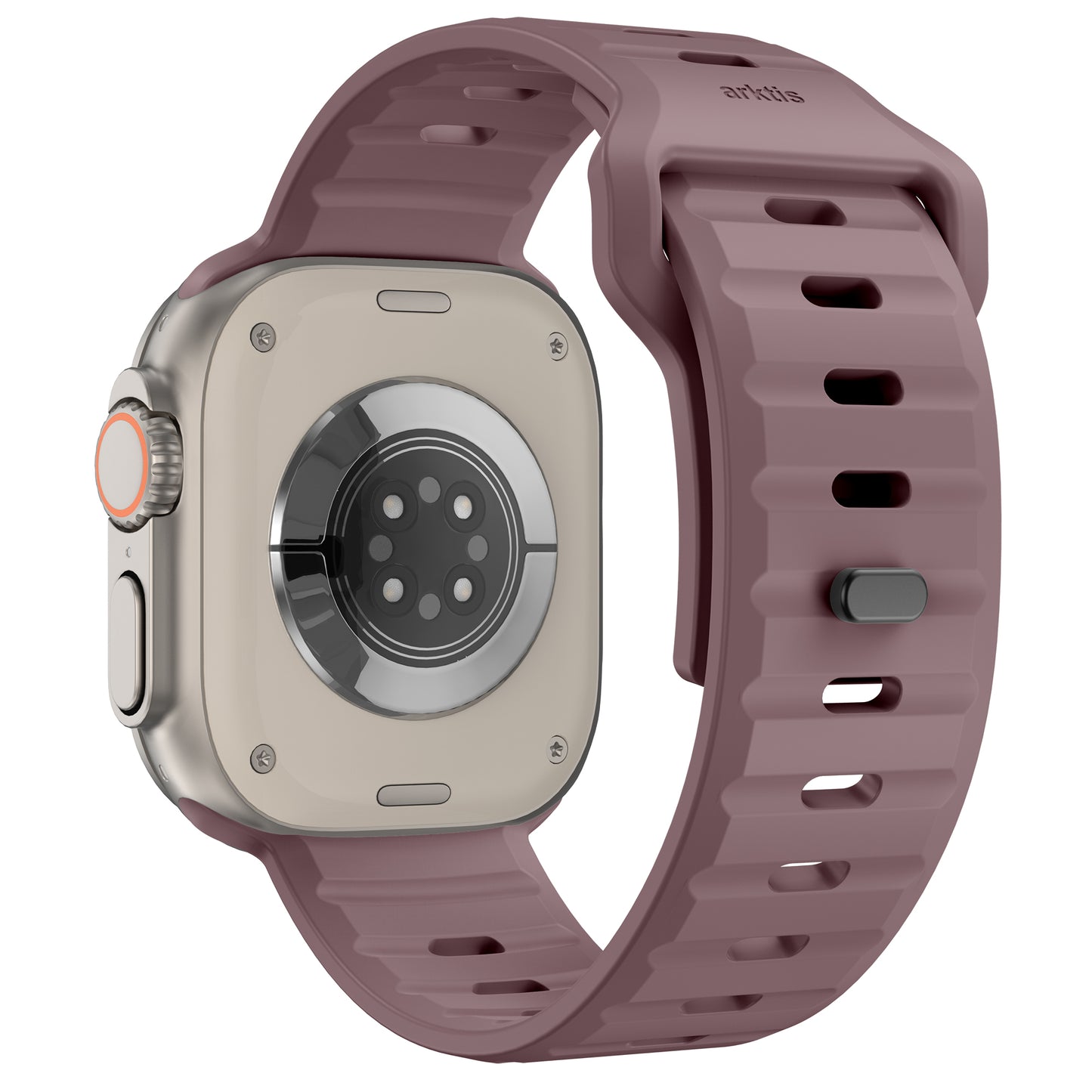 Eine Nahaufnahme des Arktisband Apple Watch Silikonarmbands „Active“ zeigt seine malvenfarbene Farbe, das gerippte, atmungsaktive Design und die Sensoren auf dem Metallgehäuse der Uhr, wobei auch der Seitenknopf und die digitale Krone sichtbar sind.