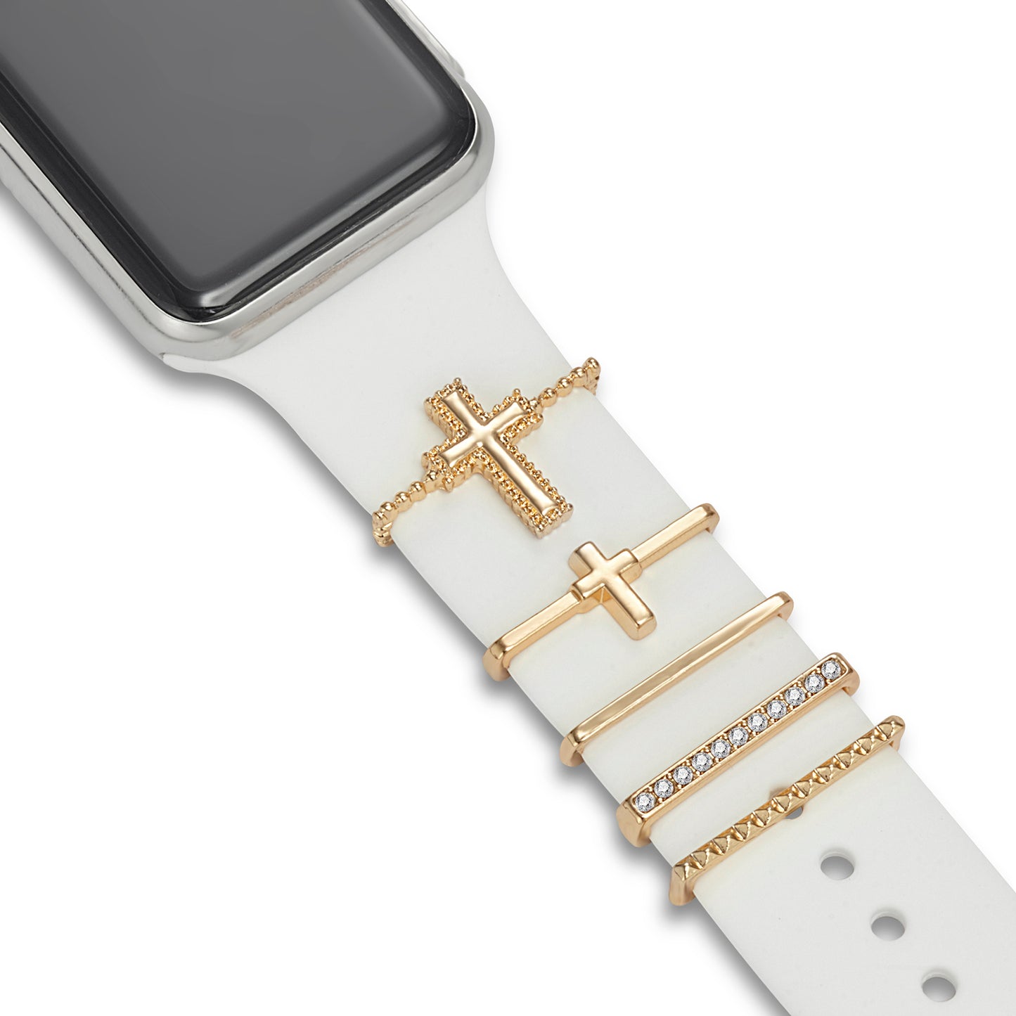 Ein weißes Smartwatch-Armband ist mit fünf goldenen Ringen mit Kreuzen und Nieten verziert, ideal, um Ihren Look mit den Apple Watch Armband Charms von arktisband individuell zu gestalten.