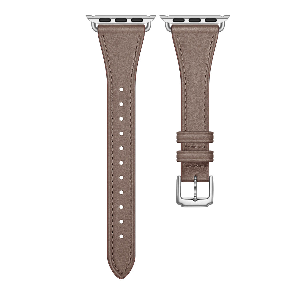 Ein Paar braune Arktisband Apple Watch Lederarmbänder „Napoli“ mit silbernen Schnallen und Anschlüssen, entworfen für Ihre Smartwatch, auf weißem Hintergrund für einen minimalistischen Look.