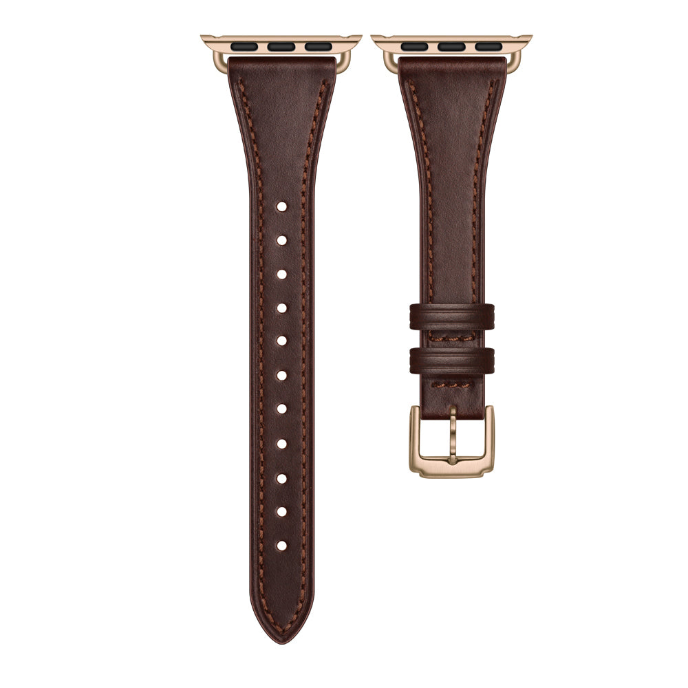 Zwei Teile des arktisband Apple Watch Lederarmbands „Napoli“ aus echtem Leder mit goldenen Details sind nebeneinander auf weißem Hintergrund abgebildet. Eines hat Einstelllöcher, das andere verfügt über eine Schnalle und eine Schlaufe für einen minimalistischen Look.