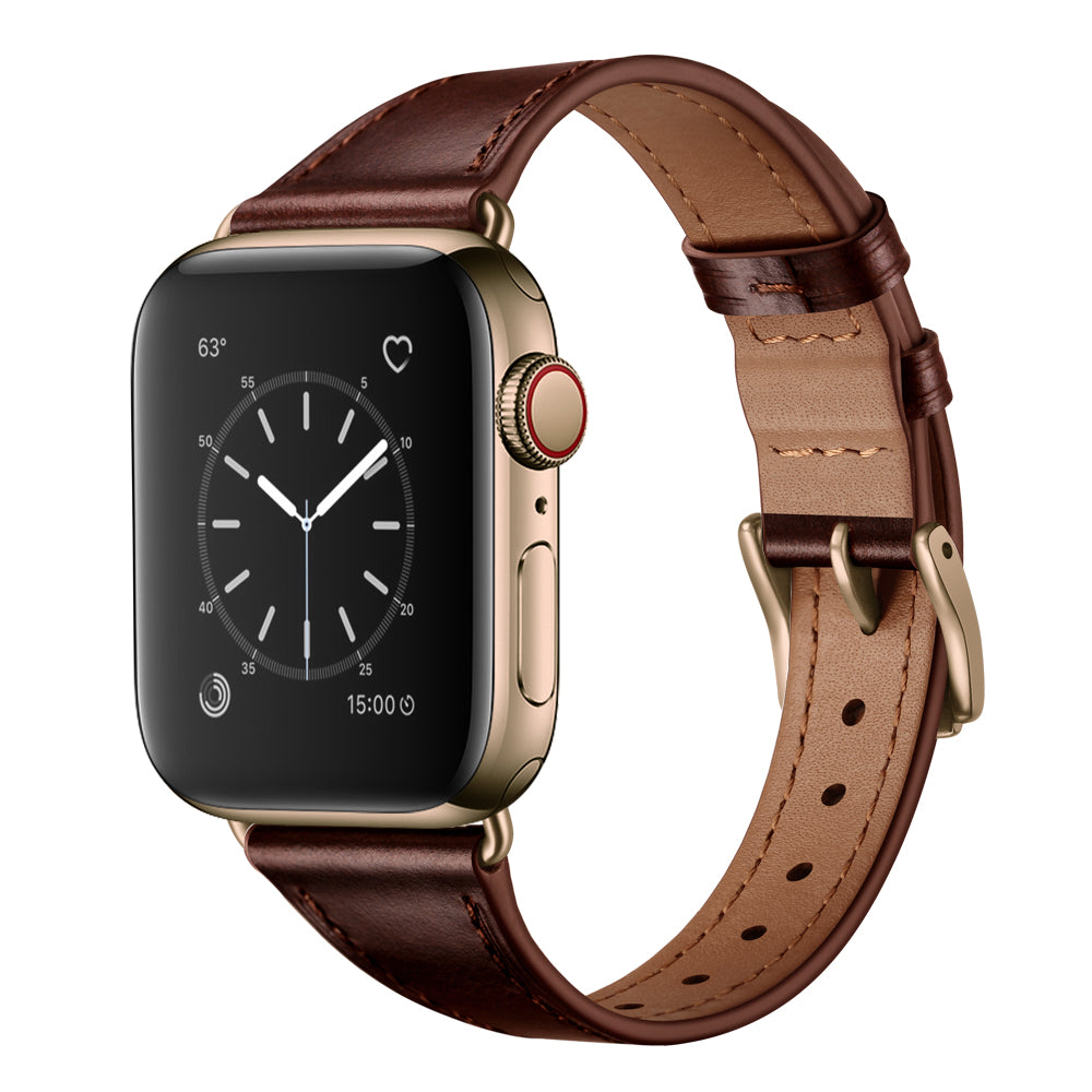 Das arktisband Apple Watch Lederarmband „Napoli“ von arktisband ist in Gold mit einem braunen Echtlederband erhältlich und zeigt auf seinem Display eine analoge Uhr sowie Temperatur- und Herzfrequenzsymbole an. Sein minimalistischer Stil wird vor einem weißen Hintergrund hervorgehoben.