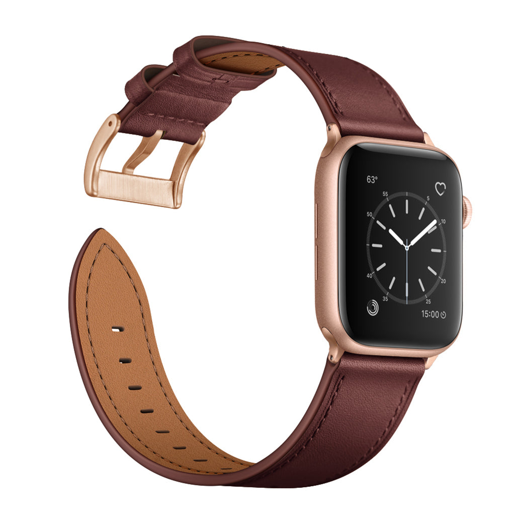 Das arktisband Apple Watch Lederarmband "Premium" von arktisband ist eine goldene Smartwatch mit braunem Echtlederarmband, kompatibel mit Apple Watch, und verfügt über ein analoges Ziffernblatt auf seinem Display.