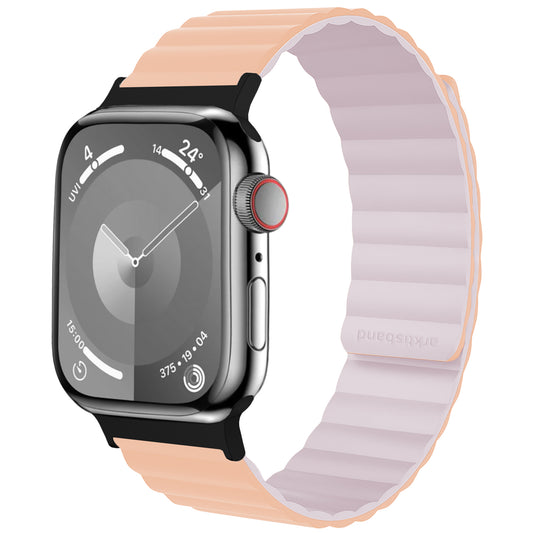 Das arktisband Apple Watch Wendearmband „Switch“ verfügt über ein rundes Display, ein silbernes Gehäuse und ein pfirsich-weiß segmentiertes Magnetband – kompatibel mit Apple Watch Armband-Zubehör für vielseitigen Stil.