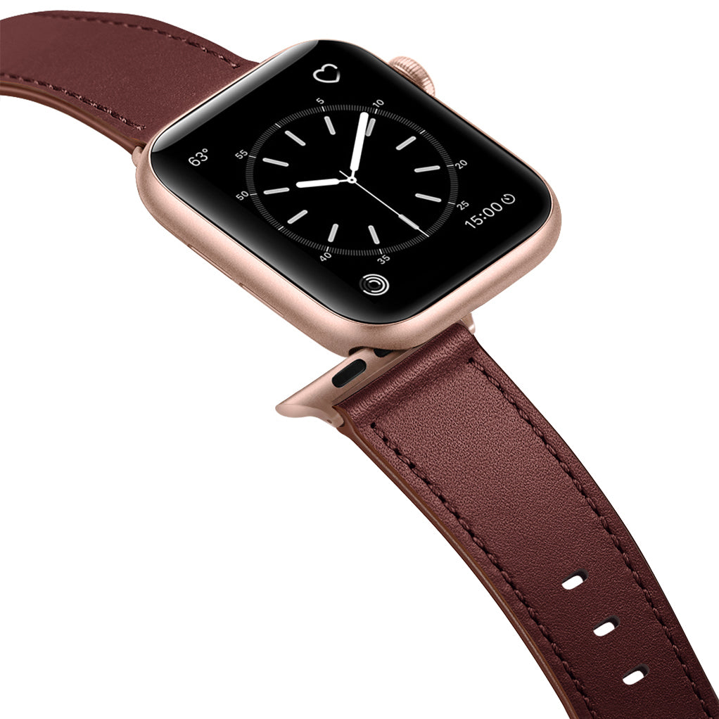 Das arktisband Apple Watch Lederarmband "Premium" von arktisband bietet ein braunes echtes Lederarmband für Ihre Apple Watch, hier gepaart mit einem roségoldenen Gehäuse und einem analogen Zifferblatt auf dem Display.