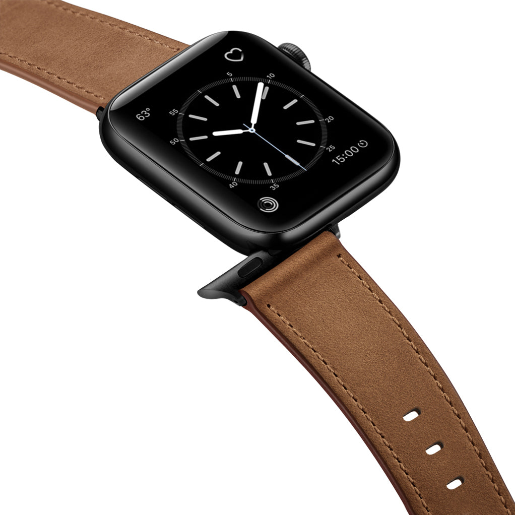 Das arktisband Apple Watch Lederarmband "Premium" ist ein braunes Echtlederarmband für die Apple Watch, hier abgebildet mit einer schwarzen Smartwatch mit analogem Zifferblatt.