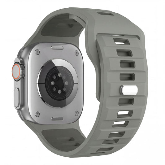 Das Arktisband Apple Watch Silikonarmband "Runner" in grau, 26 mm breit, wird von der Rückseite mit seinem robusten Band und sichtbaren Sensoren gezeigt.