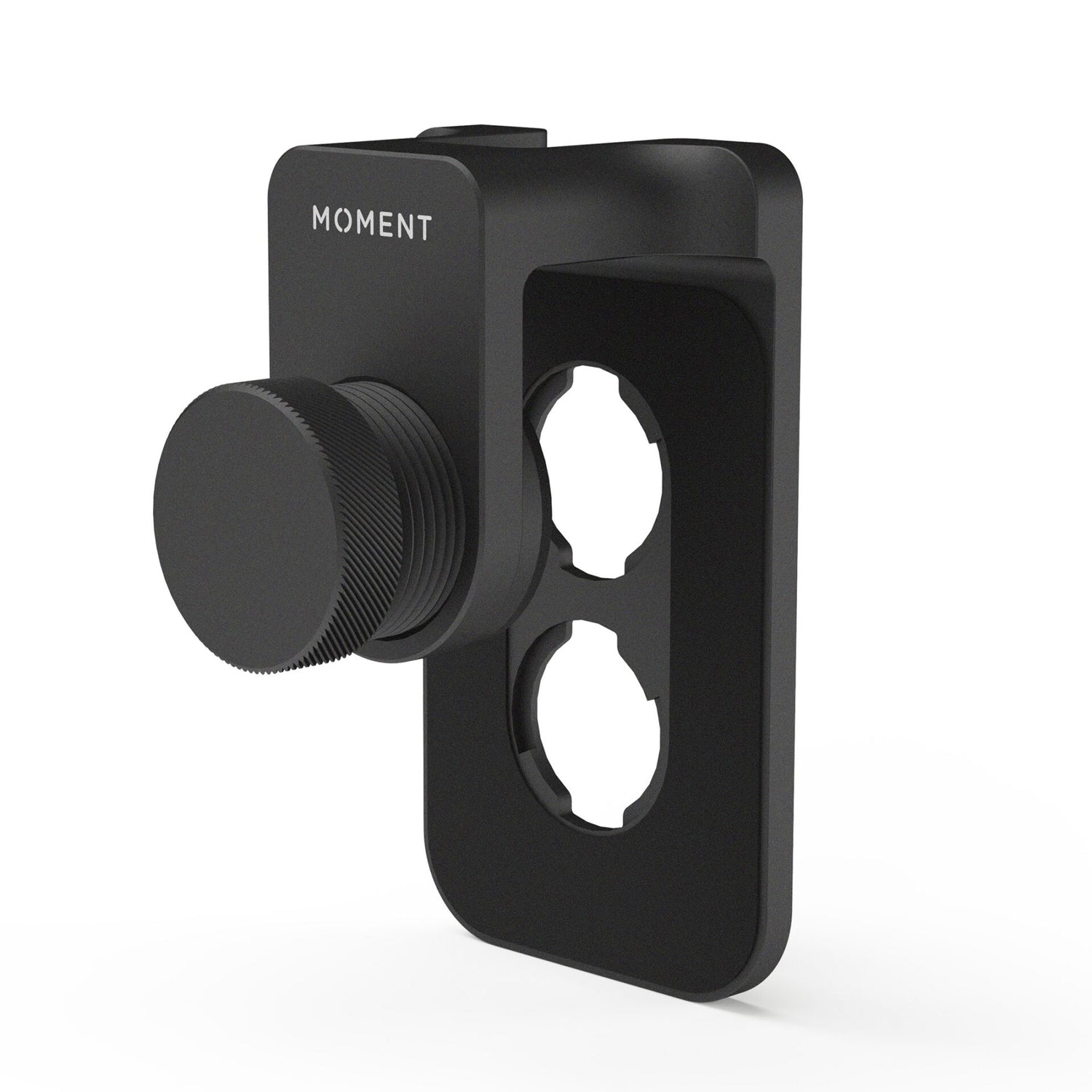 Der MOMENT Universal Lens Mount Clip T-Series verfügt über einen großen Verstellknopf und zwei kreisförmige Befestigungslöcher. Damit ist er ideal für die sichere Befestigung Ihrer Moment T-Series Objektive oder als iPhone Objektivhalter.
