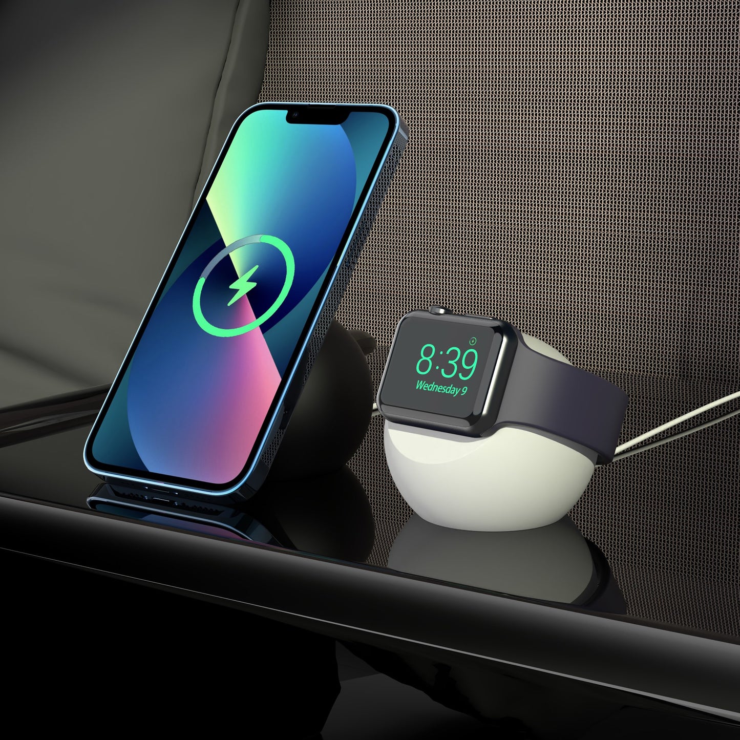 Ein Smartphone und eine Smartwatch werden auf einer eleganten schwarzen Oberfläche mit digitalen Anzeigen aufgeladen, die mit dem arktis Apple Watch Orbit Stand von arktis für zusätzlichen Komfort und Stil ordentlich organisiert sind.