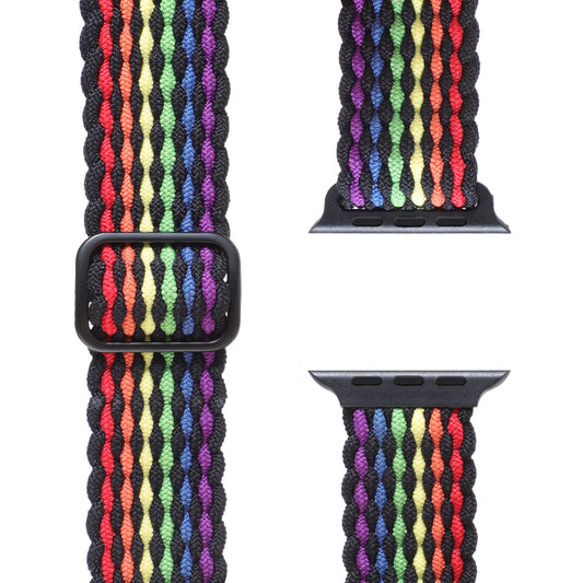 Nahaufnahme des geflochtenen Flex Loop Pride Armbands von Arktisband für die Apple Watch mit einem geflochtenen Nylondesign in Regenbogenfarben mit sichtbaren Anschlüssen und einer schwarzen Einstellschnalle.
