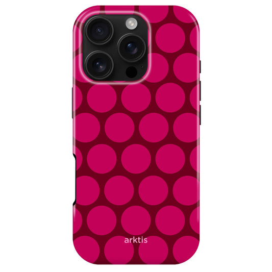 Die arktis iPhone 16 Pro Hülle - Polka Dots von arktis überzeugt mit stoßabsorbierendem TPU-Silikon, MagSafe-Kompatibilität, dunkelpinkem Polka-Dot-Muster auf hellem Grund und dem "arktis" Schriftzug am unteren Rand.