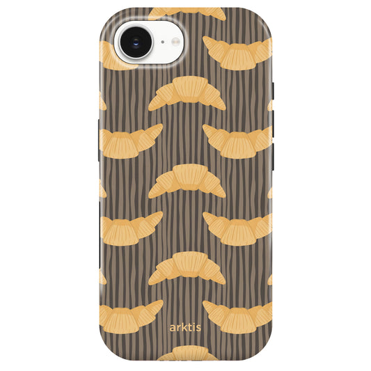 Die arktis iPhone 16e Hülle - French Breakfast bietet stoßabsorbierendes TPU-Silikon, Croissant-Muster auf dunklem Streifen-Design und arktis-Schriftzug. MagSafe-kompatibel für einfaches Laden.