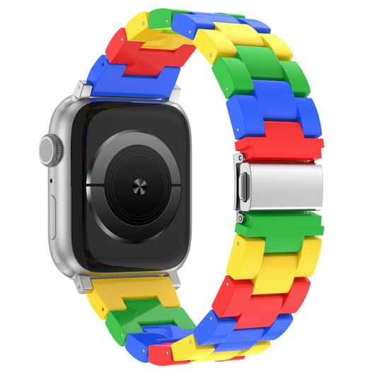 Das arktisband Apple Watch "Pixel Band" besticht durch seinen lebendigen Retro-Look mit roten, gelben, blauen und grünen Gliedern aus robustem Acrylglas.