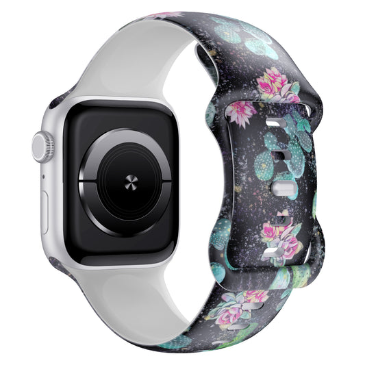 Das arktisband Desert Apple Watch Armband von arktisband verfügt über ein floral gemustertes Silikonband mit rosafarbenen Blumen und grünen Blättern auf dunklem Hintergrund - ideal für den Sport oder das tägliche Tragen.