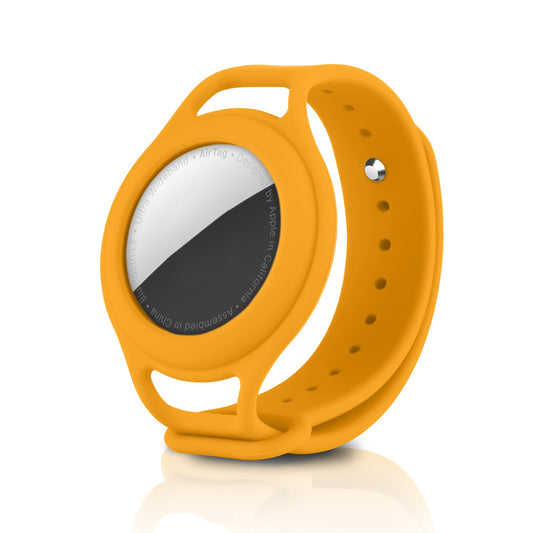 Das ArktisPRO AirTag-Armband für Kinder von ArktisPRO ist ein gelber Silikonhalter für Apple AirTag, der als praktisches Armband auf weißem Hintergrund konzipiert ist.